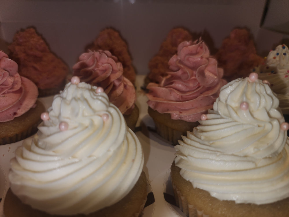 Close-up of vanilla and strawberry buttercream