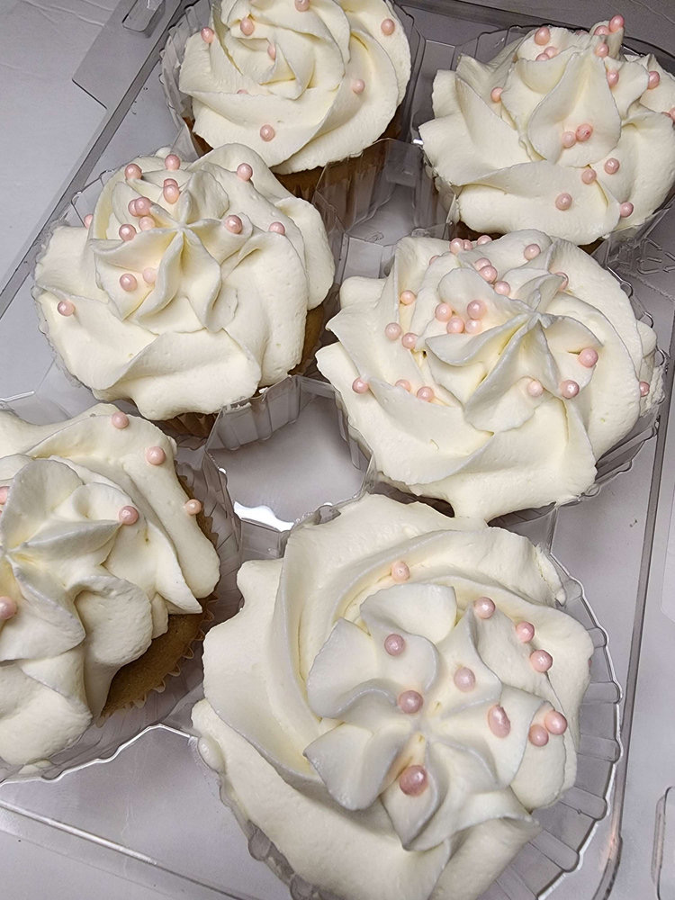 Vanilla cupcakes with blush pearl sprinkles
